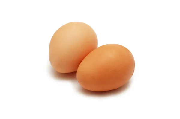 Deux œufs isolés sur le blanc — Photo