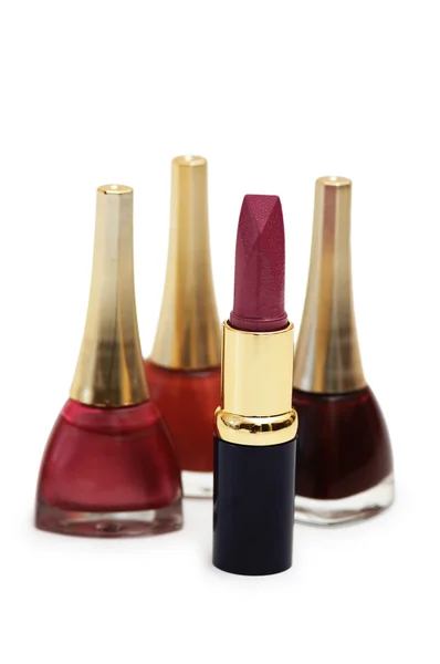 Lipstick and nail polish isolated — Stockfoto