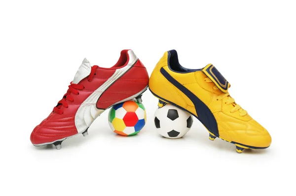 Soccer footwear and color footballs — Stock Photo, Image