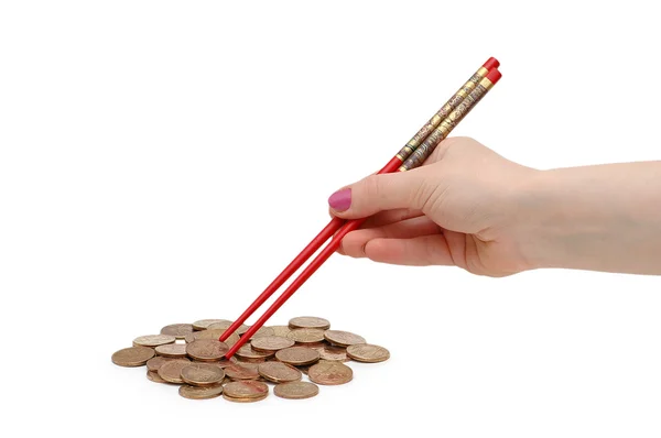 stock image Hand with red chopsticks