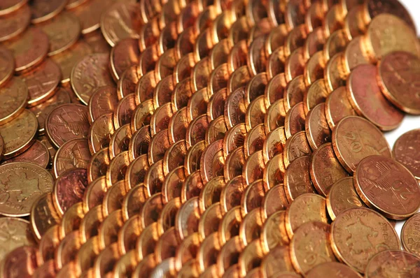 Filas de monedas de oro dispuestas —  Fotos de Stock