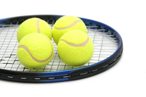 Tennis balls on the racket — Stock Photo, Image