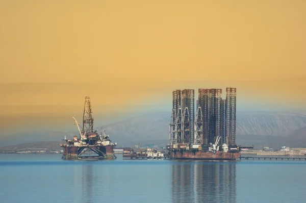 stock image Two offshore rigs at Caspian shore