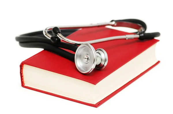 Stetoskop izole kırmızı kitap — Stok fotoğraf