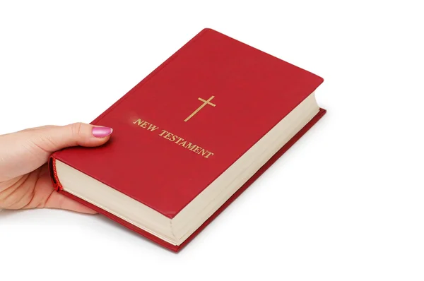 Hand som håller "nya testamentet" — Stockfoto