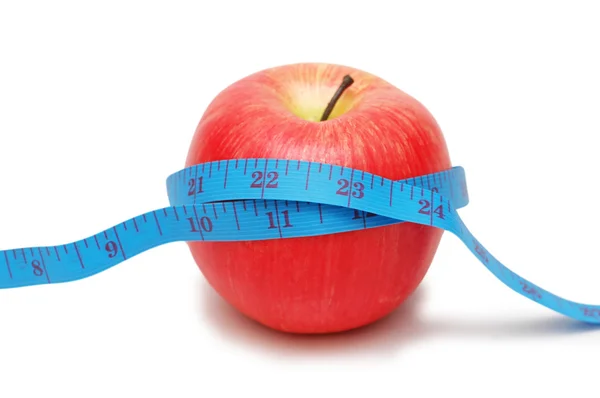 Kırmızı elma ve ölçü bandı — Stok fotoğraf