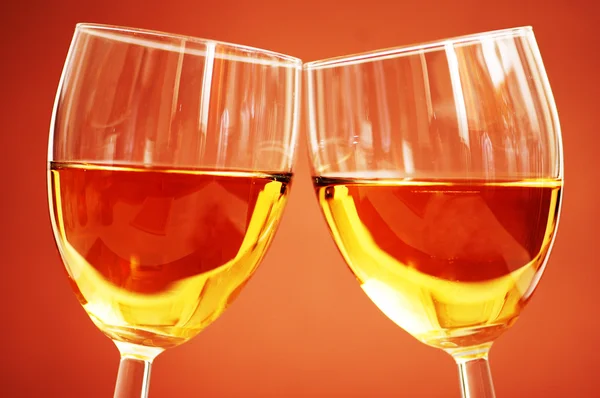 Two wine glasses on the biege — Stock Photo, Image