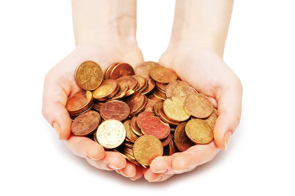 Mãos segurando muitas moedas isoladas — Fotografia de Stock