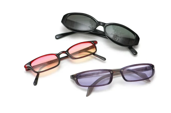 Drei Paar Sonnenbrillen isoliert — Stockfoto