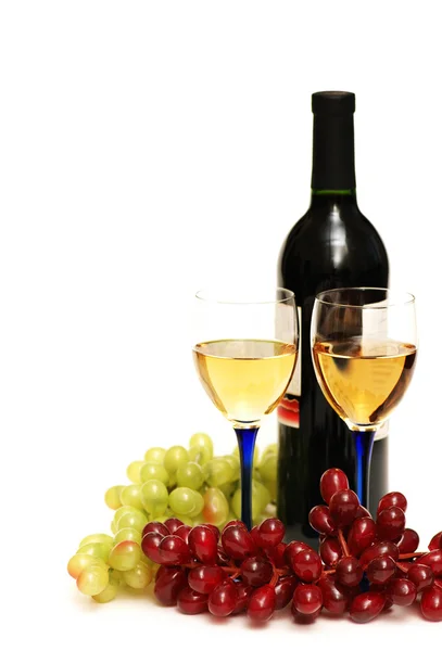 Two glasses of wine, bottle and grapes — Stock Photo, Image