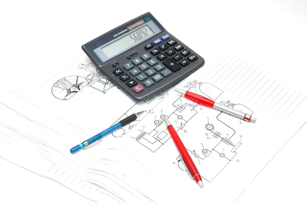 Pens and calculator — Stock Photo, Image