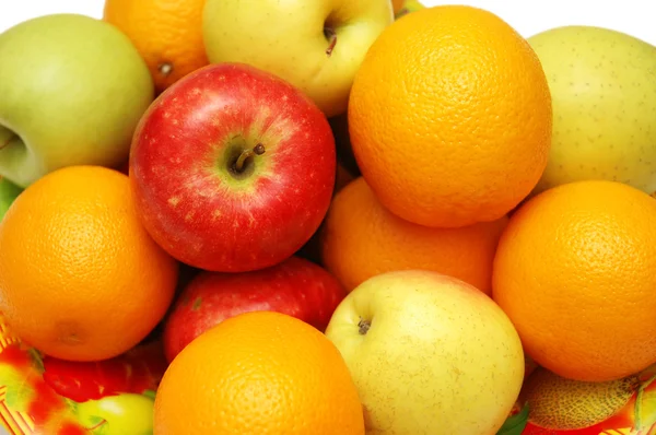 Sinaasappels en appels geassorteerde in de lade — Stockfoto