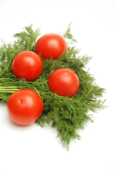 Tomates y hierbas aisladas Fotos De Stock