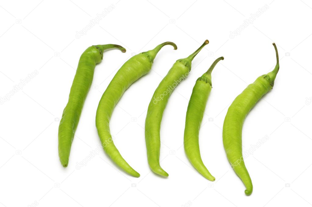 Green peppers isolated on the white