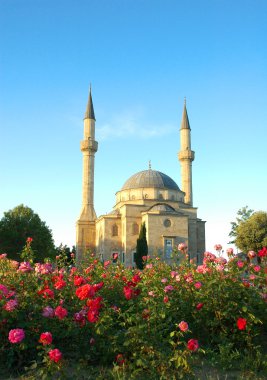 Mosque with two minarets in Baku clipart