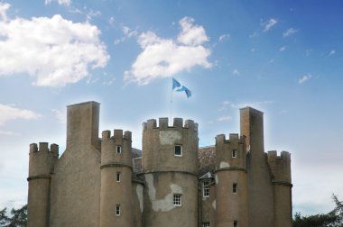 Ancient castle in Scotland on bright day clipart