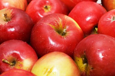 Red apples arranged on the tray clipart