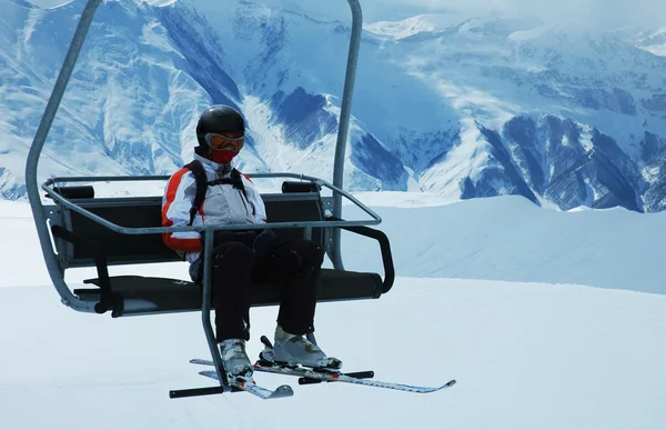 stock image Skier on chair lift at ski resort