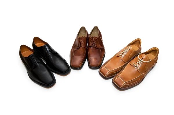 Três pares de sapatos isolados — Fotografia de Stock