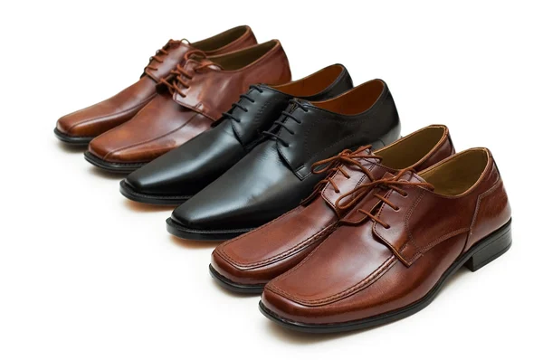 Vários sapatos masculinos isolados — Fotografia de Stock
