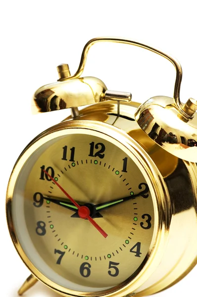 Relógio de alarme dourado isolado — Fotografia de Stock