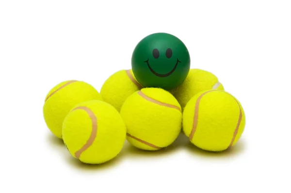 网球球和孤立的笑脸 — 图库照片