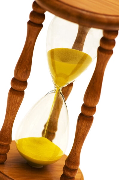 Wooden hourglass isolated on the white