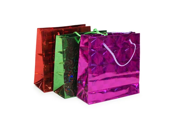 Três sacos de compras isolados — Fotografia de Stock