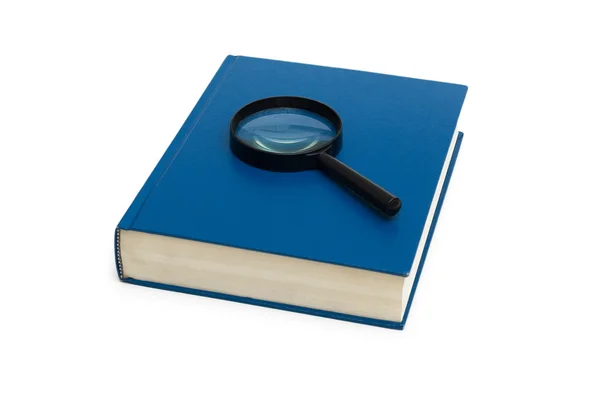Μπλε βιβλίο και μεγεθυντικό φακό — Φωτογραφία Αρχείου