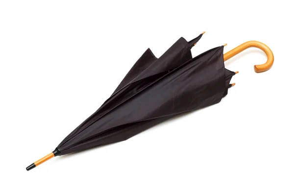 Zwarte paraplu geïsoleerd op de witte — Stockfoto