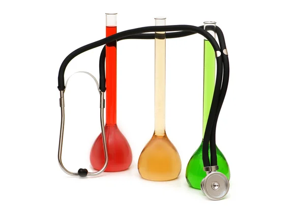 Three tubes and stethoscope — Stock Photo, Image