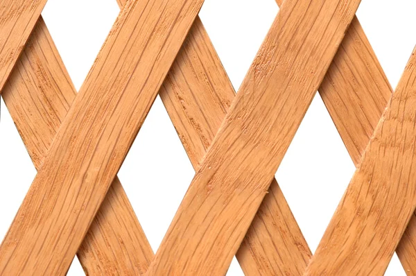 Trä spaljé med romb hål — Stockfoto