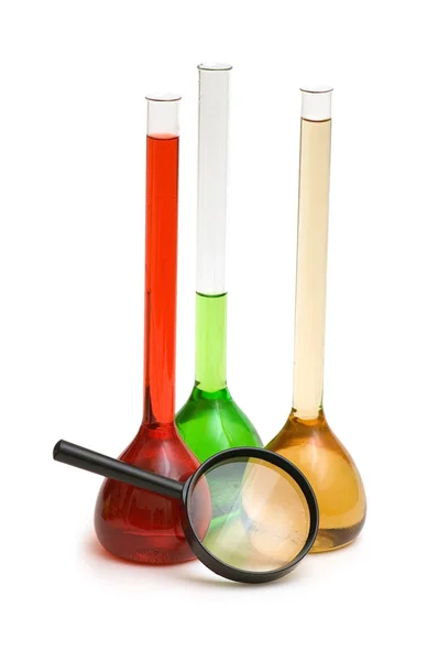 Lente e tubos coloridos isolados — Fotografia de Stock
