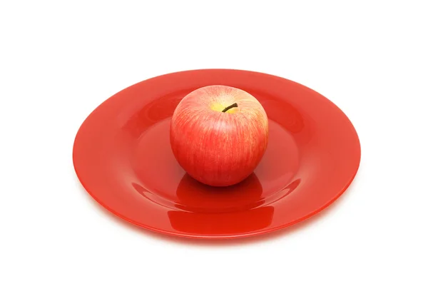 Κόκκινο μήλο και πλάκα απομονωθεί — Φωτογραφία Αρχείου