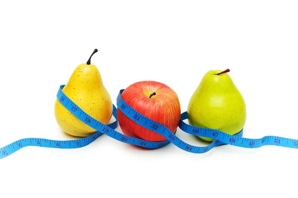 Peras y manzana que ilustran la dieta —  Fotos de Stock