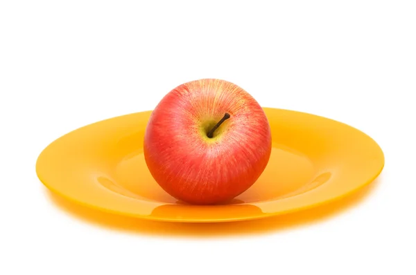 Czerwone jabłko i płyta na białym tle — Zdjęcie stockowe