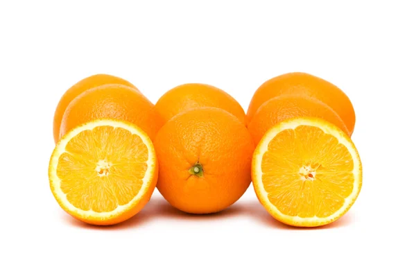 Birçok portakal üzerinde beyaz izole — Stok fotoğraf