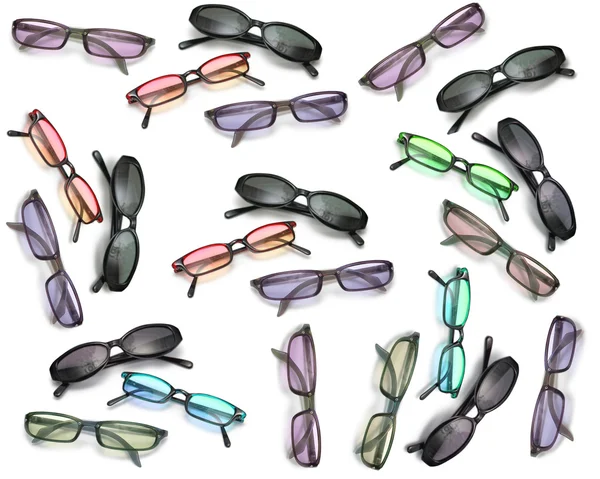 Lots of sunglasses isolated on white — Stock Photo, Image