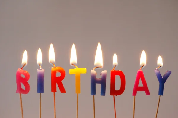 Burning candles - "Birthday" — Stock Photo, Image