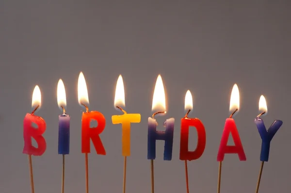 Burning candles - "Birthday" — Stock Photo, Image
