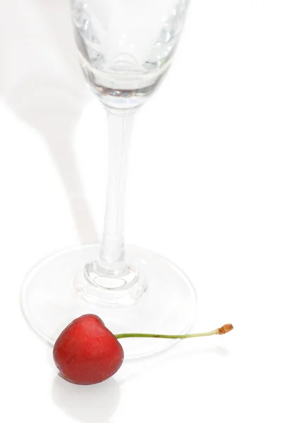 Glass with cherry isolated — Stock Photo, Image