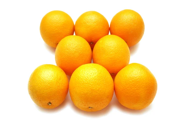 De nombreuses oranges isolées sur le blanc — Photo