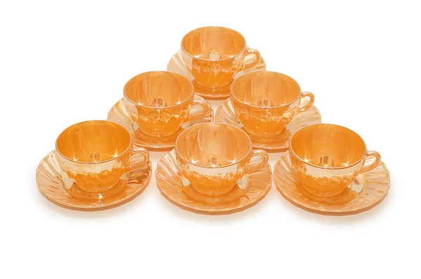 Оранжевые чашки изолированы на белом — стоковое фото