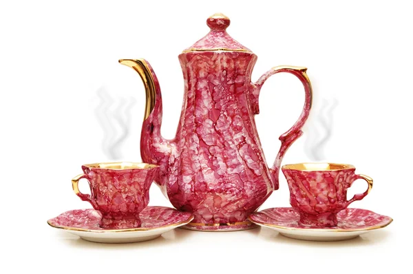 Panela de chá e copos isolados no branco — Fotografia de Stock