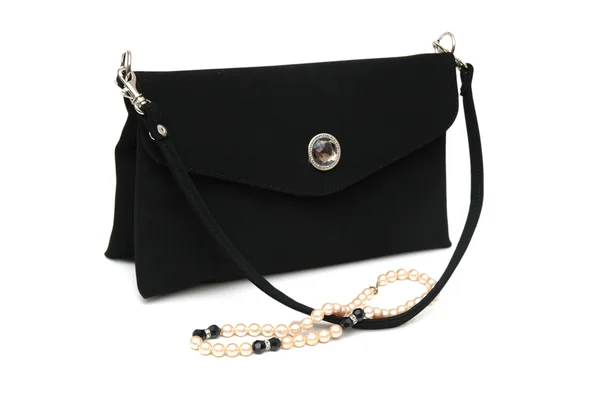 Schwarze Handtasche und Perlenkette — Stockfoto