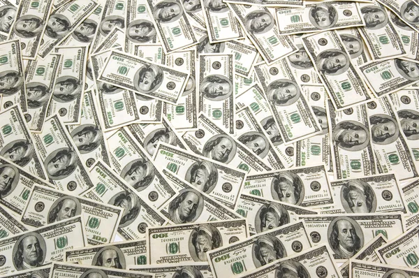 Sok-sok dollár-bankjegyek az asztalon Stock Fotó