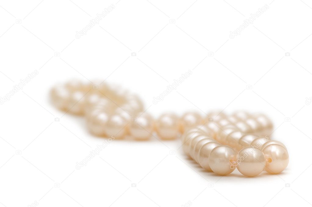 Pearl necklace on white