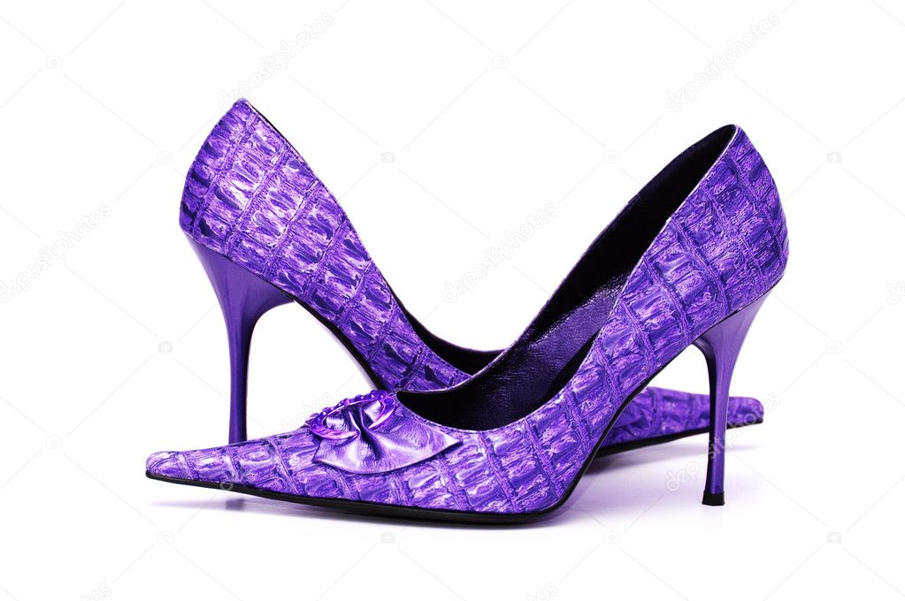 Pair of shiny female shoes isolated
