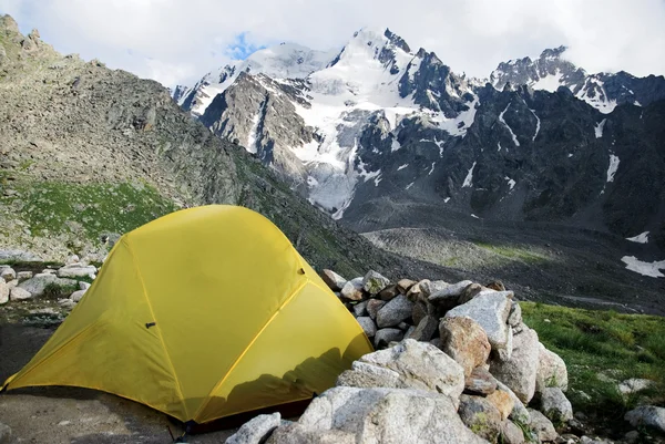 stock image Yellow tent in the Caucasus