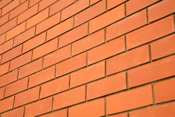 Muur van rode bakstenen — Stockfoto